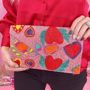 Wing heart beaded clutch